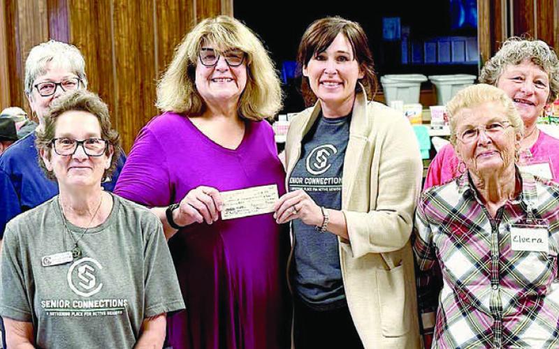 A genero us donation was recently made to Senior Connections by the Weimar Encore Lions Club and Senior Connections is grateful for this gift. Shown are (from left) Sue Mullens, Lions service chair; Linda Heller, Lions membership chair; Stephanie Shroyer, Senior Connections program director; Denise Koenig, Lions treasurer; Amanda Kridel, Senior Connections executive director; Elvera Kahlich, Lions charter member; Janiece Collins, Lions member; and Mary Ann Brenner, Lions secretary.