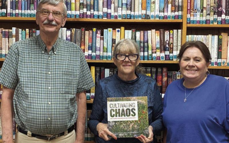 Garden Club donates book to library