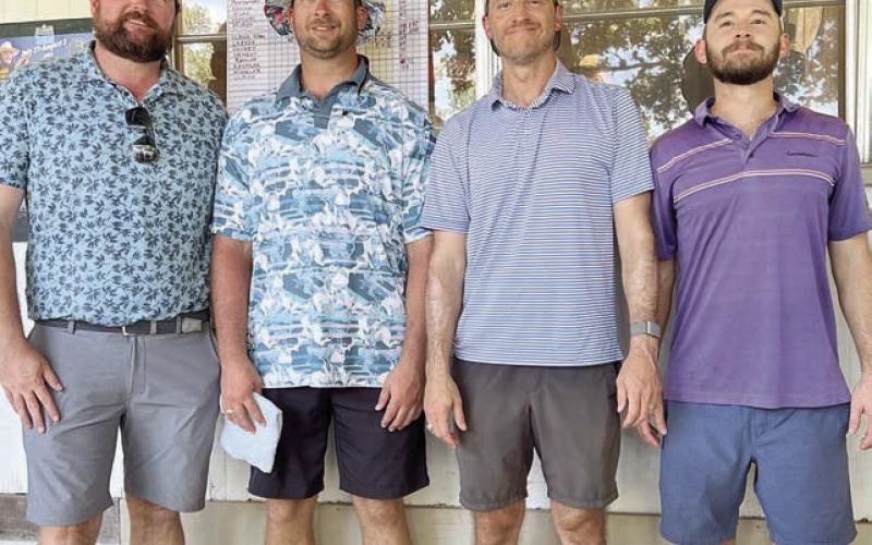 Second Flight, 1st Place (7 under par / 65) – (from left) Sean McCourt, Ryan Havrda, Geoffrey Schiffli, and Jordan Schiffli.