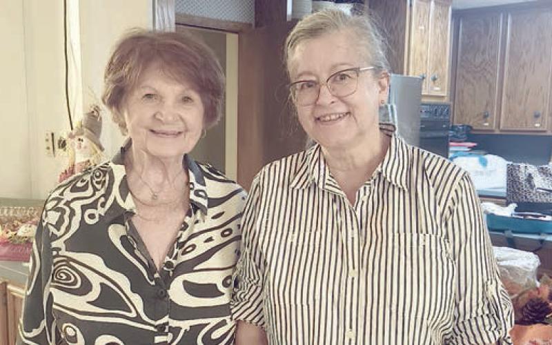 New members welcomed into the Garden Cub were (from left) Lily Hilscher and Karen Miley.