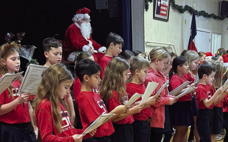 The second, third and fourth grade students from St. Rose of Lima Catholic School entertained with music and laughter.