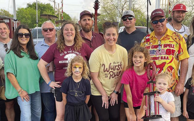 “ALL IN THE FAMILY” – (front, from left) June Schiffli, Lane Schiffli, Malynn Willey, Penelope Machac, Margot Machac; (middle row, from left) Pam Havrda, Amy Machac, Allison Machac, Kayla Willey, Tim Havrda; (back, from left) Dellyn Havrda, Jordan Machac, Jackie Machac, Scott Willey, Ryan Besetzny, and Ryan and Anna Havrda. Sticker Photo By Darrell Vyvjala