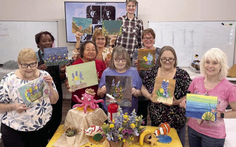 In Jaime Janda’s Artful Friday class, students were tasked to paint a still life. Whether they chose to focus on one small section or a large portion of the display, each created something very individual and unique. Shown are (from left) Maxine Farley, Deborah Jones, Amparo Salinas, Nancy Hillary, Verna Lenth-front, Jaime Janda, Berni Gillings, Sharon Friedrich and Kim Penland.