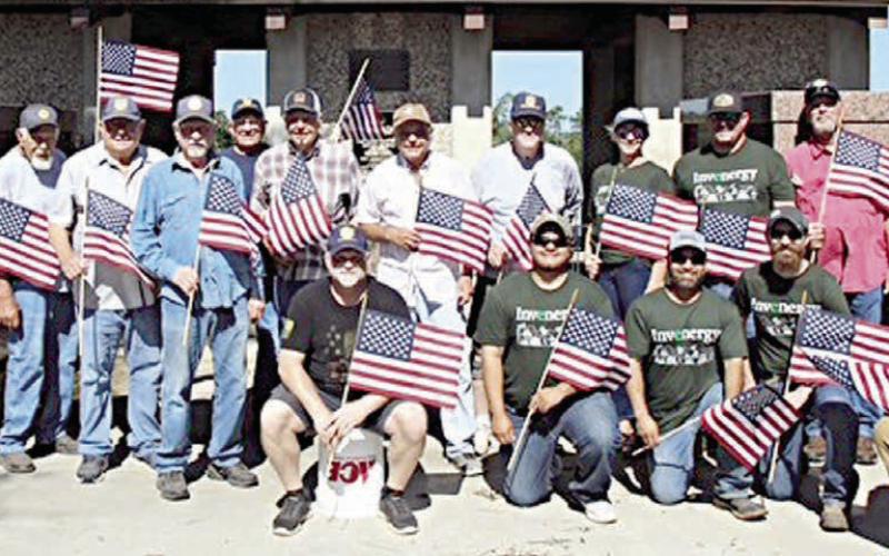 Legion, other groups place flags on veterans’ graves for Memorial Day