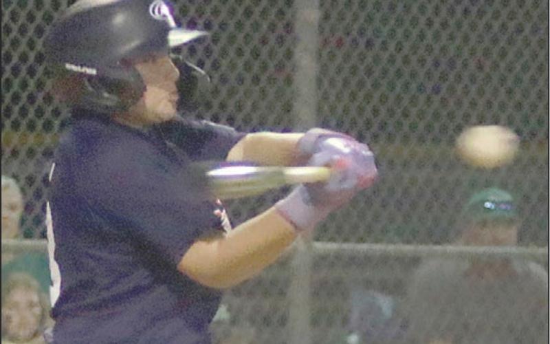 Draden Chudej connects for a two-out, two-RBI double in the bottom of the sixth inning. Sticker Photo By Darrell Vyvjala