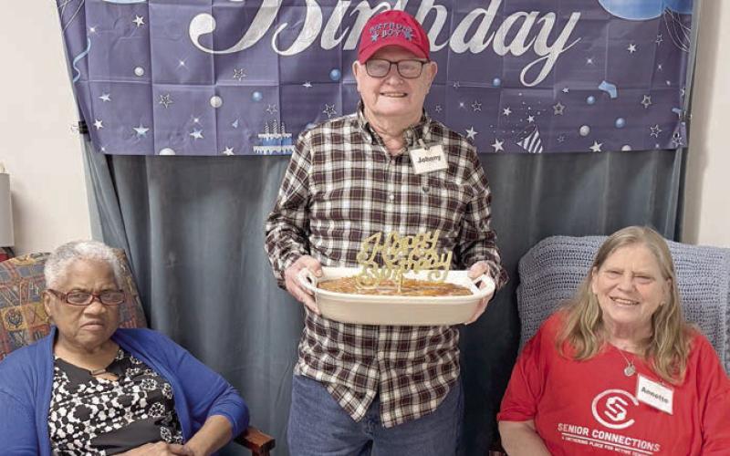 May birthdays were celebrated, with (from left) Kathryn Moore, Johnny Fojtik and Annette Jasek present for the photo, along with a special cake baked by a special lady.