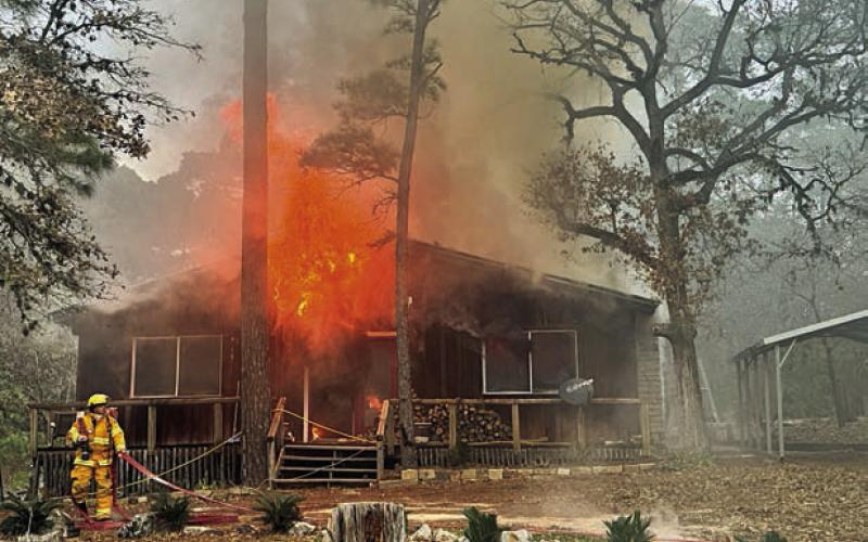 A RESIDENCE in the Clear Lake Pines subdivision was a total loss following a fire on Wednesday, Jan. 8. The Winchester Volunteer Fire Department was dispatched to the scene, with mutual aid provided by the La Grange VFD and South Lee County VFD. Photos Courtesy of Fayette County Sheriff's Office