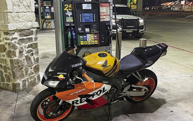 The motorcycle shown above as well as its driver were found at The Texan store following a high-speed chase on Interstate 10 on Saturday.