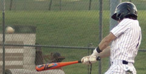 Cooper Demel sends a base-clearing triple to right field in the second inning. Sticker Photo By Darrell Vyvjala