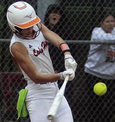 Mikayla Stang connects for an RBI-single. Sticker Photo By Darrell Vyvjala