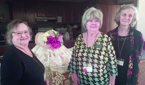 Host ess es were (from left) Carolyn Neely, Bonnie Baker and Wanda Brown.