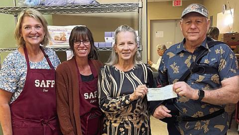 Lions Club donates to Food Pantry