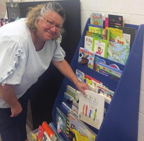 Stephanie Love, who will lead the Learn &amp; Play Room sessions at Schulenburg ISD, is getting the book center ready. Since parents are their child’s first and most important teacher, part of the L&amp;P time is parents reading with their child and working on nursery rhymes.