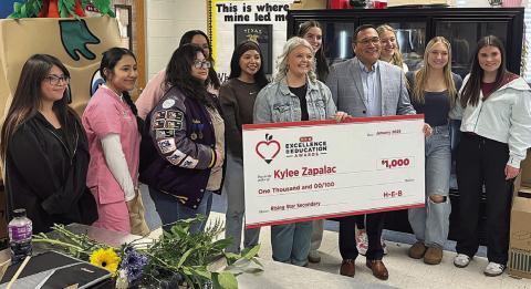 SHS grad garners teaching award from HEB
