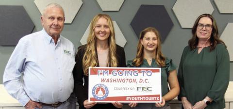 Congrat ulat ing Laney Bludau (second from left) of Hallettsville High School and Gretchen Sacks (second from right) of Round Top-Carmine High School, winners of FEC’s 2026 Government-in-Action Youth Tour contest, are Fayette Electric Cooperative board president Joseph Kruppa (left) and FEC Youth Tour coordinator Tracy Denton (right).