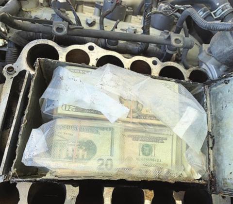 U.S. currency concealed in the engine area in an aftermarket false compartment was located during a traffic stop on I-10 at Flatonia by Drug Interdiction Investigator David Smith.