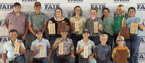 Fayette County 4-H members participating in the Washington County Livestock Judging Contest were (front row, from left) Bowen Bishop, Tate Fritsch, Hudson Holub, Crockett Guenther, Joseph Carrales, Rowdy Guenther, (back row) Rilan Karisch, Holden Holub, Rheagan Karisch, Tatum Fritsch, Kaisley Janecka, Laramie Laake, Hailey Janish, Adalyn Carrales, (not shown) Stockton Emshoff and Emma Zweschper.