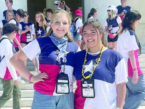 Chosen to participate in last year’s Government-in-Action Youth Tour to Washington, D.C. were (foreground, from left) Reagan Moreau of Round Top and Rylynn Thumann of Weimar.