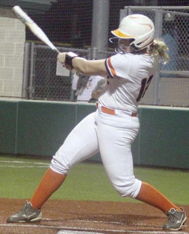 Summer Livingston follows through on a swing that plated the Lady Horns’ only run against Charlotte. Sticker Photo By Darrell Vyvjala