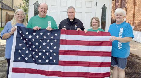 Catholic Life donates flag to st. Rose cemetery