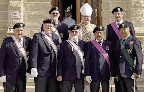 4th Degree KCs lead procession for Mass at Praha
