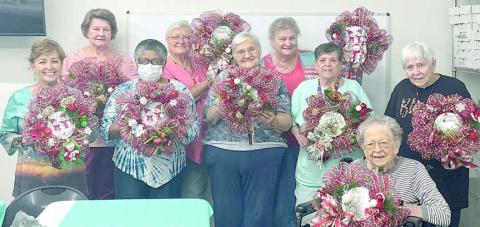 A very festive wreath-making class was taught by Martha Beckmann last month. Participating in the Artful Friday class held at Arts For Rural Texas were (from left) Martha Beckmann, Delores Bittner, Janice Collins, Lillian Vanicek, Cynthia Meyer, Cathy Besetsny, Julie Hill, Irene Janda and Mary Ann Jurica.