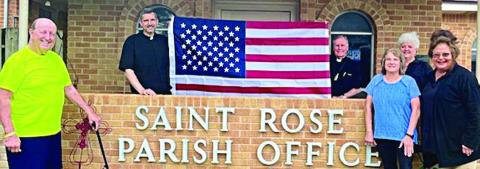 The Schulenburg-High Hill branch of Catholic Life Insurance donated a U.S. flag to St Rose of Lima Catholic Church. Shown with the flag are (from left) Royce Shimek, branch secretary-treasurer; Fr. Luke Prihoda and Fr. Jasper Liggio; Jeanette Vaculik, branch third vice president; Ann Florus, branch first vice president; and Lynette Vyvjala, branch president.