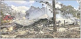 Structure burns north of La Grange