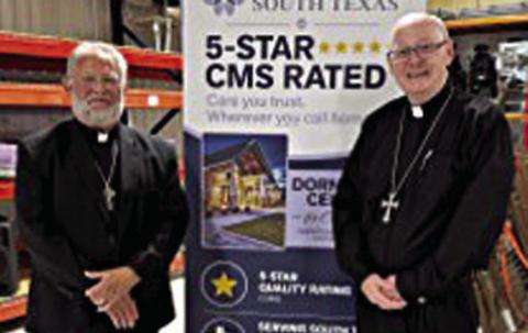 A new support services building in Victoria for Hospice of South Texas was dedicated by Pastor Herb Beyer (left), who serves area Lutheran churches, and Bishop Brendan Cahill (right) of the Catholic Diocese of Victoria.