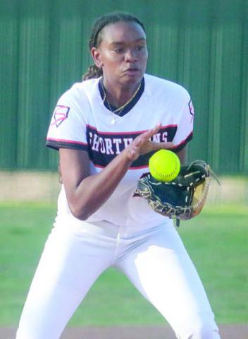 Third baseman Jashiya Jackson stays with a high hopper for an out against Weimar. Sticker Photo By Darrell Vyvjala