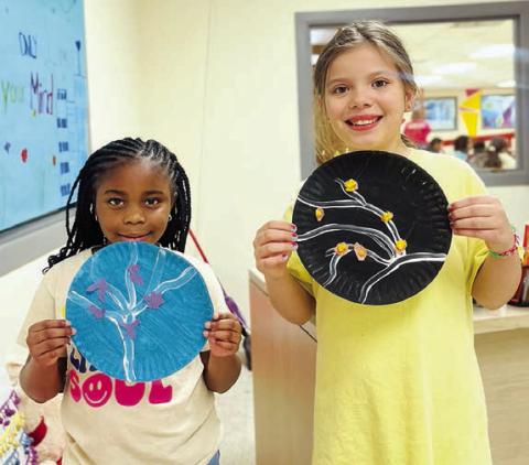 Since it’s the beginning of the spring session at the Schulenburg Unit of the Boys &amp; Girls Club, staff conducted a lovely cherry blossom art project for kids to share with the public! Shown are Club members (from left) Legacy Crenshaw and Nevaeh Muras.
