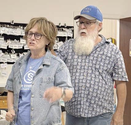 An informative “safe and secure” workshop was presented by David McCall in Schulenburg in August. He covered car and travel safety, including hands-on identification of the spare tire and jack in each participant’s vehicle, along with home security and personal safety. He is shown with Lucy Stanzel demonstrating how to get away from someone who grabs you from behind – the trick is to turn in toward the attacker and then go for his or her eyes.