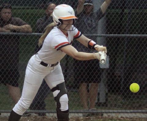 Angel Davis drops down a bunt for a hit in last Monday’s home game. Sticker Photo By Darrell Vyvjala