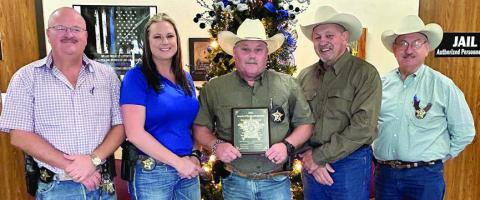 At the plaque presentation for Deputy of the Quarter are Sheriff’s Office personnel (from left) Lt. David Beyer, Sgt. Angela Lala, Investigator Marc Bennett-award recipient, Sheriff Keith Korenek and Chief Deputy Randy Noviskie.