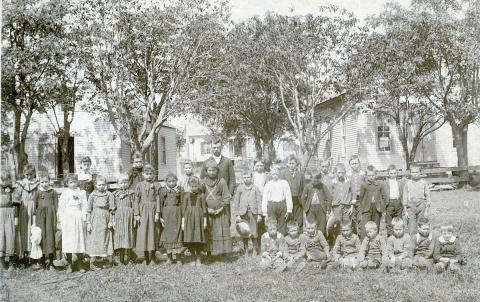 The Willow Springs school building on the left was one of those early rural schools that had been built by November 1875. The 1870s teacherage, which still stands as a private residence, is in the background of this mid 1890s photo. The “new” school building is on the right. Photo Courtesy of Fayette Heritage Museum & Archives