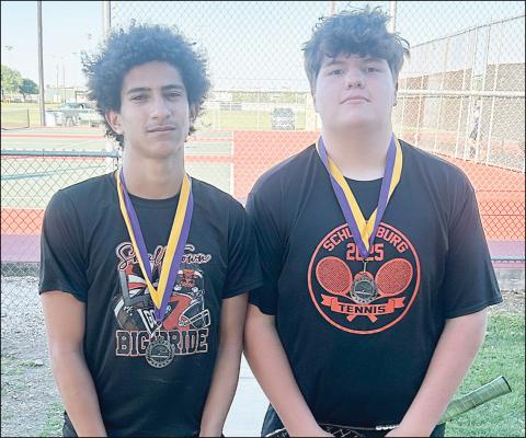 Denver Carr (left) and Hayes Baumgarten, shown with medals they earned at  an event earlier this spring, competed in the Class 2A Region IV Tennis Tournament, held May 9-10 in Corpus Christi.