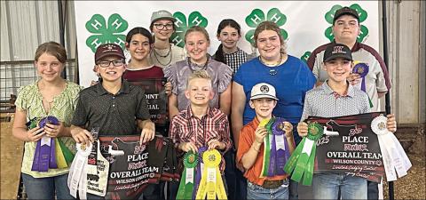 Fayette County 4-H’ers participating in the Wilson County Youth Livestock Judging Contest were (front row, from left) Hayleigh Pizzitola, Tate Fritsch, Joe Carrales, Rowdy Guenther, Crockett Guenther, (middle row) Adalyn Carrales, Julia Melton, Rheagan Karisch, (back row) Tatum Fritsch, Laramie Laake, Rilan Karisch, (not shown) Hudson Holub and Holden Holub.