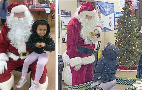 Santa visits Tenth Frame bowling alley