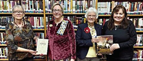 Presentation at Schulenburg Public Library – (from left) Cindy Lytle, Schulenburg Public Library staff; Kim Joost, Smith-McMillan Chapter librarian; Carolyn Caflisch, Smith-McMillan Chapter regent; and Donna Holub, Schulenburg Public Library staff.