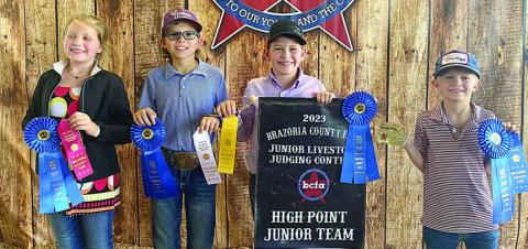 Grand Champion Junior Team – (from left) Hayleigh Pizzitola, Tate Fritsch, Hudson Holub and Joe Carrales. Holub is a member of the Schulenburg 4-H.