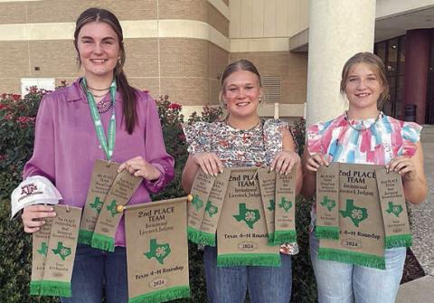In Invitational Livestock Judging, the team of Madyson Holub, Haley Schramek and Kyrroll Prihoda won reserve champion honors. (This photo, and accompanying information, also appeared in the June 13 issue on Page 1.)