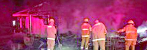 Trailer, garage total loss in fire