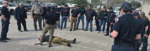 Responders learn how to do a rapid medical evaluation in a potentially hostile environment. They are taught to sweep for major bleeding, apply a tourniquet if needed, clear the airway, and place the victim in the recovery position.