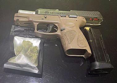 SPD officers found the marijuana and handgun shown above after a traffic stop early Friday morning.