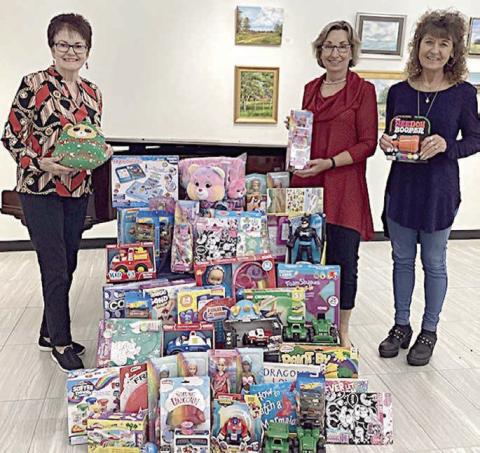 Literary Club collects for Deputy Santa Once again, members of the Schulenburg Literary Club hope to make Christmas a little merrier for some area children. Their collection of toys for the Fayette County Sheriff’s Department’s Deputy Santa program is displayed by members (from left) Betty Herzik, Diana Mikesky and Janice Simons.