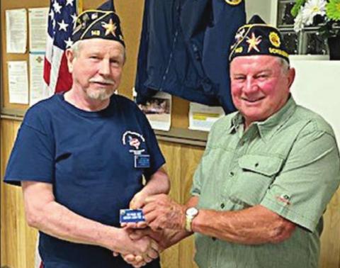 HARRY BARTOSCH (left) was welcomed as the new American Legion Post 143 War Wagon chief by commander Bob Heinrich (left) at the Oct. 5 meeting