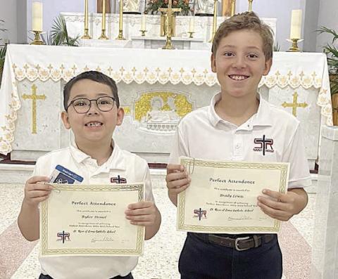 Perfect attendance for the entire 2024-25 school year at St. Rose of Lima Catholic School was achieved by (from left) Ryker Demel and Brody Lewis.