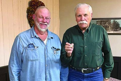 A 75-year membersh ip pin was presented to Milton Mache (right) by Hermann Sons Life Lodge 14 president Ed Moeller (left) at the meeting on Wednesday, Feb. 8.