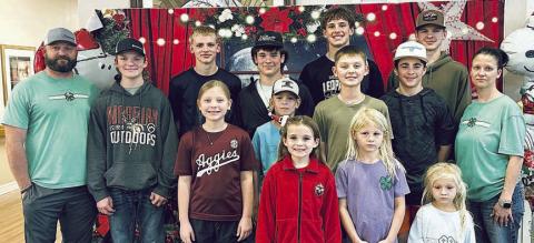 Shown at Monument Hill Nursing Home are (front row, from left) Lillian Muras, Allie Zbranek, Naomi Zbranek, (middle row) Cooter Maxwell, Ty Maxwell, Coral Hrbacek, Luke Zbranek, Rowdy Hrbacek, Collin Horton, Ashley Conrad, (back row) Quade Brothers, Casen Conrad, Koen Zbranek and James Zbranek.
