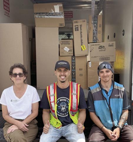 Amazon selected Senior Connections as its “Non-Profit of the Month” to receive donations, and as a result Senior Connections was given a huge amount of items for bingo prizes as well as kitchen supplies. Program director Stephanie Shroyer (left) is shown with Mo and Zack from Amazon out of Kyle.